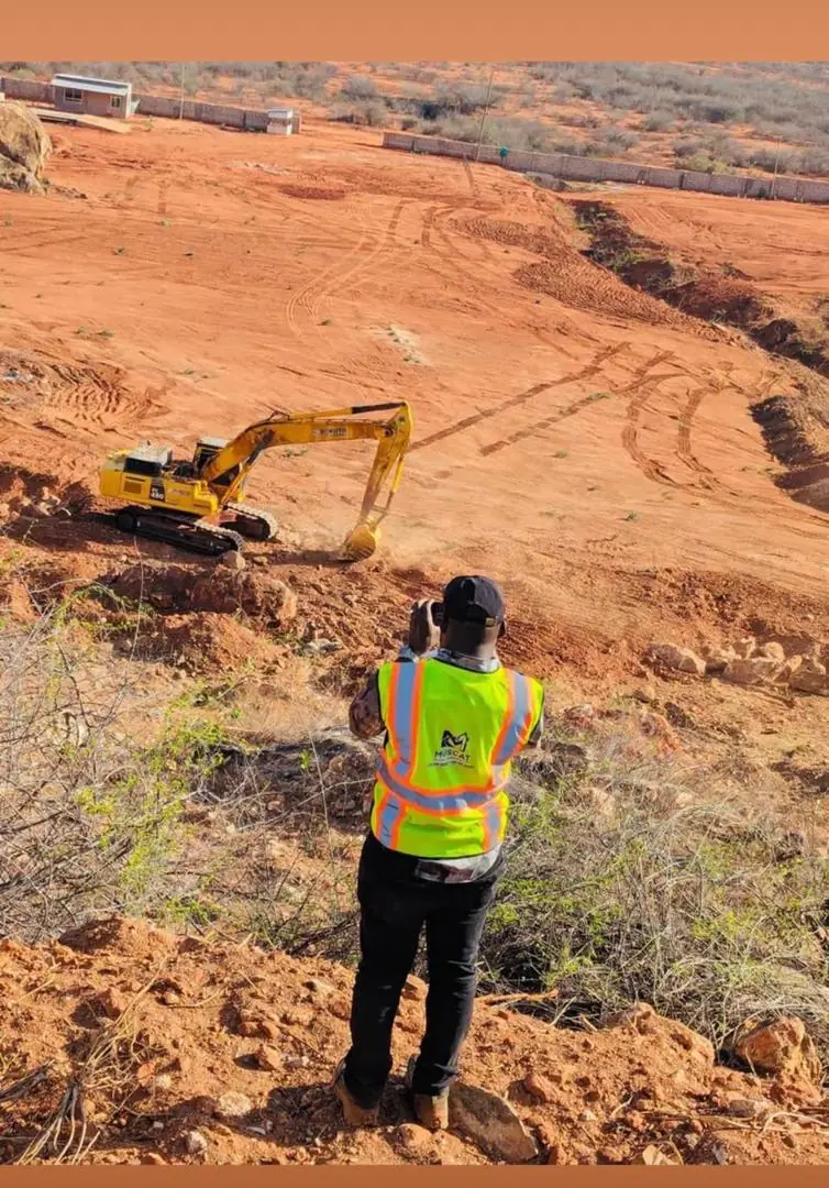 Site worker in full PPE on an active earthworks site